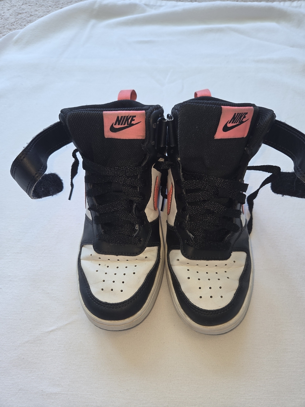 Nike Kids Black and White High-Top Sneakers with Pink Accents